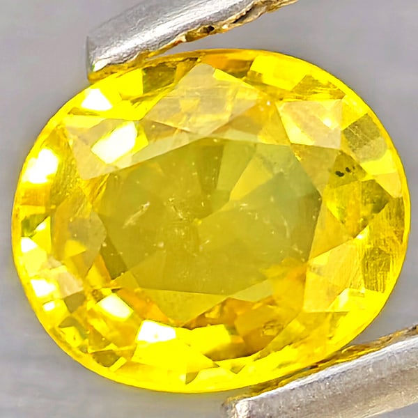 Natural Yellow Sapphire Gemstones 0.47 Ct. Oval Shape 4.9 x 4.2 Mm.: Product ID: 806162855 Product Name: Natural White Gold Weight: 0.47 CT. Size: 4.9 x 4.2 x 2.3 MM. Shape: Oval Shape Color: Yellow Clarity:VSI Luster: Good Gems Origin: Thailand Treatment: Heated Cryst