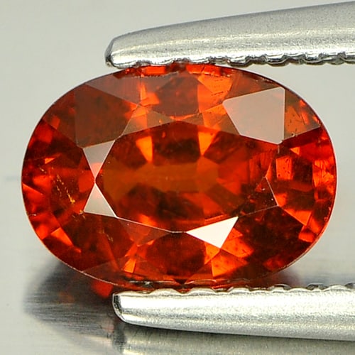 Natural Orange Spessartine Garnet Gemstones 1.29 Ct. Oval Shape 7.1 x 5.1 Mm.: Product ID: 802917807 Product Name: Natural Spessartine Weight: 1.29 CT. Size: 7.1 x 5.1 x 3.8 MM. Shape: Oval Color: Orange Clarity:SI Luster: Good Gems Origin: Nigeria Treatment: Unheated Crystal St