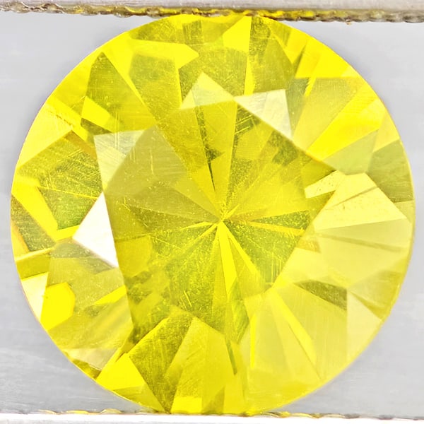 Natural Yellow Lemon Quartz Gemstones 3.24 Ct. Round Diamond Cut 10.2 Mm.: Product ID: 805530218 Product Name: Natural Quartz Weight: 3.24 CT. Size: 10.2 x 10.2 x 6.8 MM. Shape: Round Diamond Cut Color: Yellow Lemon Clarity:VSI Luster: Good Gems Origin: Brazil Treatment: Unh