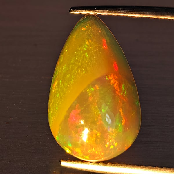 Natural Multi-Color Play Of Colour Opal Gemstone 4.91 Ct. Pear Cabochon Shape 16.8 x 10.5 Mm. (1 of 3)