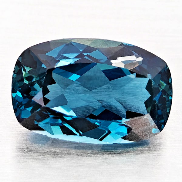 Natural London Blue Topaz Gemstones 4.41 Ct. Cushion Shape 11.7 x 7.6 Mm.: Product ID: 807168337 Product Name: Natural Blue Topaz Weight: 4.41 CT. Size: 11.7 x 7.6 x 5.8 MM. Shape: Cushion Shape Color: London Blue Clarity:VVS - VSI Luster: Good Gems Origin: Brazil Treatment:
