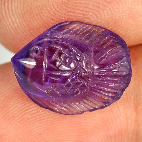 Natural Violet Amethyst Gemstones 4.61 Ct. Fish Carving Shape 14.7 x 11.5 Mm.: Product ID: 810303755 Product Name: Natural Amethyst Weight: 4.61 CT. Size: 14.7 x 11.5 x 5.2 MM. Shape: Fish Carving Color: Violet Clarity:Semi - Transparent Luster: Good Gems Origin: Brazil Treatmen