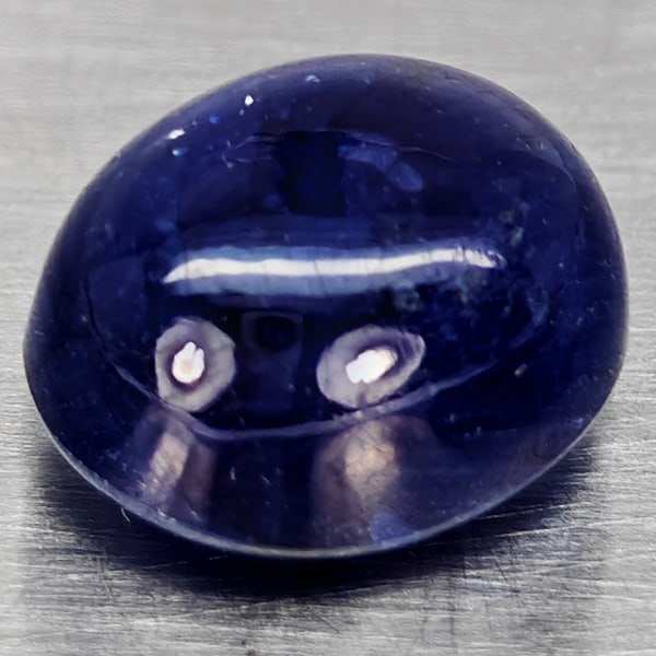 Natural Blue Sapphire Gemstones 6.15 Ct. Oval Cabochon Shape 10.1 x 8.6 Mm.: Product ID: 806012348 Product Name: Natural Blue Sapphire Weight: 6.15 CT. Size: 10.1 x 8.6 x 6.2 MM. Shape: Oval Cabochon Color: Blue Clarity:Semi - Transparent Luster: Good Gems Origin: Madagascar T
