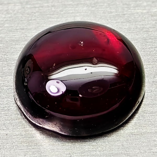 Natural Purplish Pink Rhodolite Garnet 1.71 Ct. Round Cabochon Shape 6.9 Mm.: Product ID: 802936744 Product Name: Natural Rhodolite Weight: 1.71 CT. Size: 6.9 x 6.9 x 2.9 MM. Shape: Round Cabochon Color: Purplish Pink Clarity:Semi - Transparent Luster: Good Gems Origin: Madagas