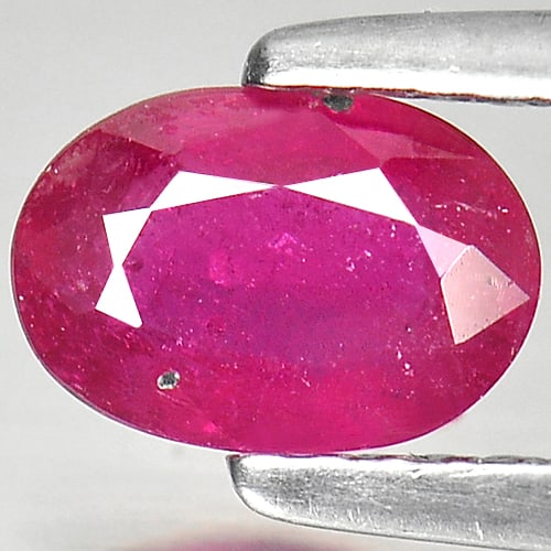 Natural Purplish Pink Ruby Gemstones 0.88 Ct. Oval Shape 6.9 x 4.7 Mm.: Product ID: 805920215 Product Name: Natural Ruby Weight: 0.88 CT. Size: 6.9 x 4.7 x 2.7 MM. Shape: Oval Color: Purplish Pink Clarity:VSI Luster: Good Gems Origin: Mozambique Treatment: Heated (Lead-gl