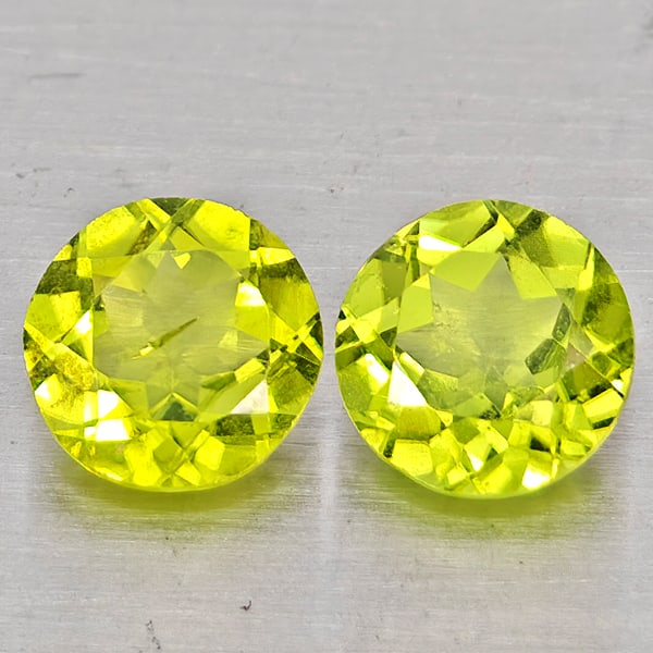 Natural Green Peridot Gemstones 1.53 Ct. 2 Pcs. Round Shape 5.9 Mm.: Product ID: 805317448 Product Name: Natural Rhodolite Weight: 1.53 CT. Size: 5.9 x 5.9 x 3.5 MM. Shape: Round Color: Green Clarity:VSI Luster: Good Gems Origin: Pakistan Treatment: Unheated Crystal St