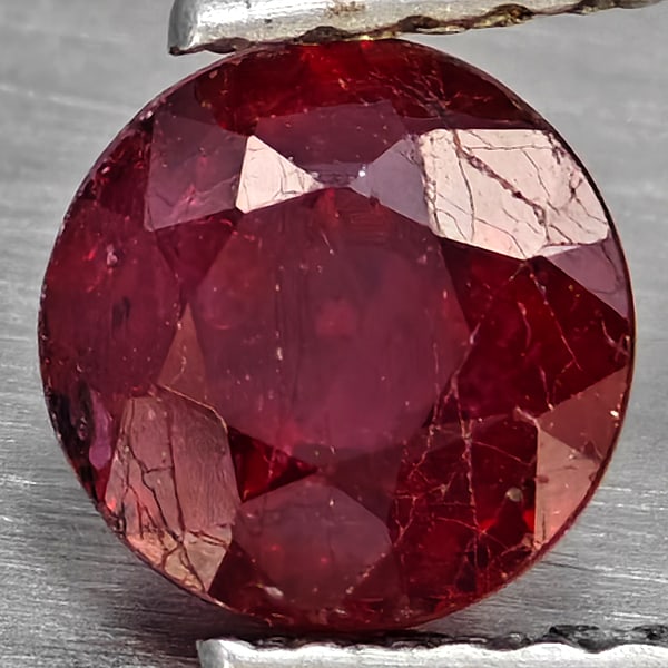 Natural Pinkish Red Ruby Gemstones 0.94 Ct. Round Shape 5.7 Mm.: Product ID: 805935871 Product Name: Natural Ruby Weight: 0.94 CT. Size: 5.7 x 5.7 x 3.5 MM. Shape: Round Color: Pinkish Red Clarity:SI1 Luster: Good Gems Origin: Madagascar Treatment: Heated (Lead-gla