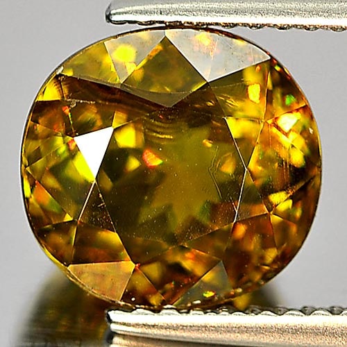 Natural Multi Color Sphene Gemstones With Rainbow Spark 4.04 Ct. Oval Shape 9.3 x 8.8 Mm: Product ID: 806506476 Product Name: Natural Sphene Weight: 4.04 CT. Size: 9.3 x 8.8 x 6.1 MM. Shape: Oval Color: Multi Color With Rainbow Spark Clarity:SI Luster: Adamantine Gems Origin: Madagascar Tr