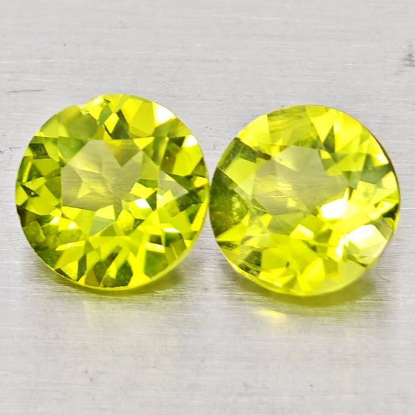 Natural Green Peridot Gemstones 1.47 Ct. 2 Pcs. Round Shape 6 Mm.: Product ID: 805317452 Product Name: Natural Rhodolite Weight: 1.47 CT. Size: 6 x 6 x 3.1 MM. Shape: Round Color: Green Clarity:VSI Luster: Good Gems Origin: Pakistan Treatment: Unheated Crystal Struct
