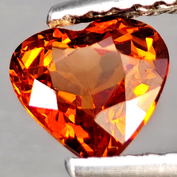 Natural Reddish Orange Spessartine Garnet Gemstones 0.95 Ct. Heart Shape 6 x 5.6 Mm: Product ID: 802937851 Product Name: Natural Spessartine Weight: 0.95 CT. Size: 6 x 5.6 x 3.5 MM. Shape: Heart Shape Color: Reddish Orange Clarity:VSI Luster: Good Gems Origin: Namibia Treatment: Unhea