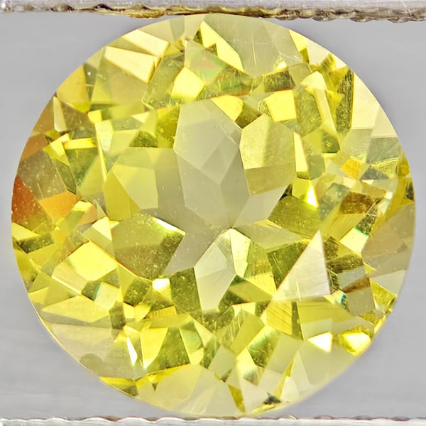 Natural Yellow Lemon Quartz Gemstone 2.86 Ct. Round Shape 9 Mm.: Product ID: 805530109 Product Name: Natural Quartz Weight: 2.86 CT. Size: 9 x 9 x 6.7 MM. Shape: Round Color: Yellow Lemon Clarity:VSI Luster: Good Gems Origin: Brazil Treatment: Unheated Crystal Stru