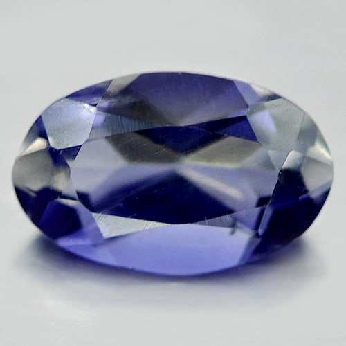 Natural Violet Blue Iolite Gemstones 0.94 Ct. Oval Shape 8.5 x 5.5 Mm.: Product ID: 803804475 Product Name: Natural Iolite Weight: 0.94 CT. Size: 8.5 x 5.5 x 3.9 MM. Shape: Oval Color: Violet Blue Clarity:VSI Luster: Good Gems Origin: Madagascar Treatment: Unheated Crysta