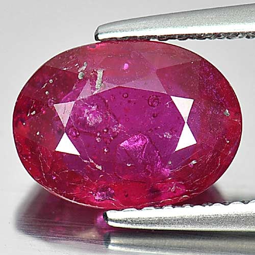 Natural Purplish Red Ruby Gemstones 3.40 Ct. Oval Shape 10.2 x 7.5 Mm.: Product ID: 805920499 Product Name: Natural Ruby Weight: 3.40 CT. Size: 10.2 x 7.5 x 4.6 MM. Shape: Oval Color: Purplish Red Clarity:VSI Luster: Good Gems Origin: Mozambique Treatment: Heated (Lead-gl