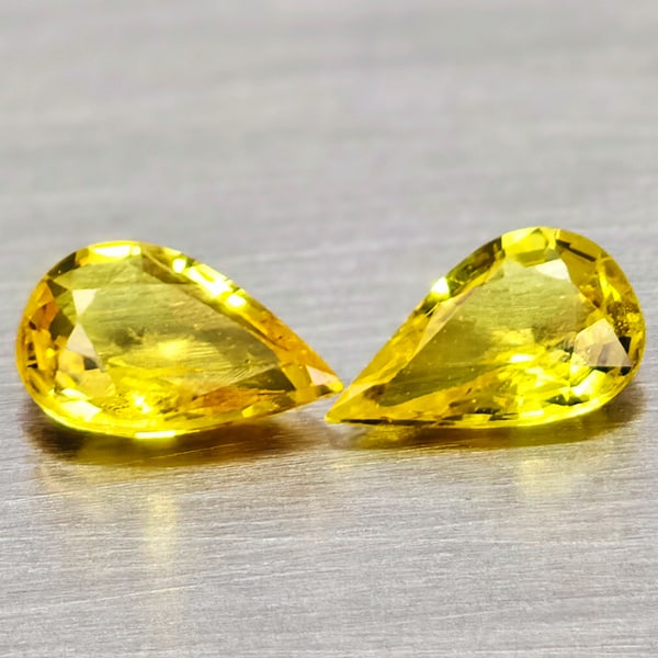 Natural Yellow Songea Sapphire Gemstones 0.78 Ct. 2 Pcs. Pear Shape 6.2 x 3.8 Mm.: Product ID: 806162328 Product Name: Natural Yellow Sapphire Weight: 0.78 CT. Size: 6.2 x 3.8 x 2.1 to 6.1 x 4 x 2.1 MM. Shape: Pear Shape Color: Yellow Clarity:VSI Luster: Good Gems Origin: Tanzania T