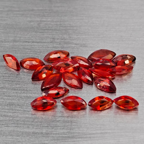 Natural Orangish Red Songea Sapphire Gemstones 1.40 Ct. 20 Pcs. Marquise Shape and Mixed Size: Product ID: 806130442 Product Name: Natural Red Sapphire Weight: 1.40 CT. Size: 4 x 2.3 x 1.2 to 3.5 x 1.9 x 1.1 MM. Shape: Marquise Shape Color: Orangish Red Clarity:SI1 Luster: Good Gems Origin: Tan