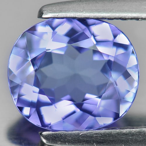 Natural blue Tanzanite Gemstones 1.42 Ct. Clean Oval Shape 7.78 x 6.85 Mm: Product ID: 807005738 Product Name: Natural Tanzanite Weight: 1.42 CT. Size: 7.78 x 6.85 x 3.64 MM. Shape: Oval Color: Violet Clarity:IF Luster: Very Good Gems Origin: Tanzania Treatment: Heated Cryst