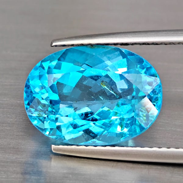 Natural Swiss Blue Topaz Gemstones 8.06 Ct. Oval Shape 13.9 x 10.1 Mm: Product ID: 807169100 Product Name: Natural Blue Topaz Weight: 8.06 CT. Size: 13.9 x 10.1 x 7.4 MM. Shape: Oval Shape Color: Swiss Blue Clarity:SI1 Luster: Good Gems Origin: Brazil Treatment: Treated 
