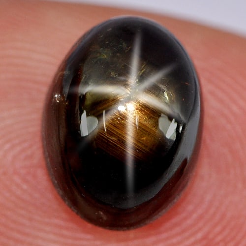 Natural Black Star Sapphire Gemstones 6 Rays 6.03 Ct. Oval Cabochon Shape 10.2 x 7.7 Mm: Product ID: 806144261 Product Name: Natural Star Sapphire Weight: 6.03 CT. Size: 10.2 x 7.7 x 6.6 MM. Shape: Oval Cabochon Color: Black Clarity:Opaque Luster: Good 6 Rays Star Gems Origin: Thailand Tr