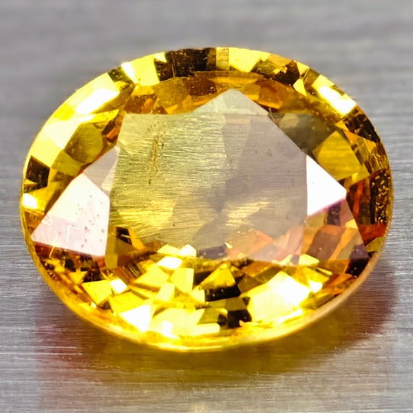 Natural Yellow Sapphire Gemstones 0.76 Ct. Oval Shape 6.1 x 5.2 Mm.: Product ID: 106104097 Product Name: Natural Yellow Sapphire Weight: 0.76 CT. Size: 6.1 x 5.2 x 2.6 MM. Shape: Oval Color: Yellow Clarity:VSI Luster: Good Gems Origin: Thailand Treatment: Heated Crysta