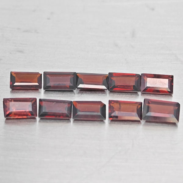 Natural Orangish Red Garnet Gemstones 3.39 Ct. 10 Pcs. Baguette Shape 5.2 x 3.2 Mm.: Product ID: 802937882 Product Name: Natural Red Garnet Weight: 3.39 CT. Size: 5.2 x 3.2 x 2.2 MM. Shape: Baguette Shape Color: Orangish Red Clarity:SI1 Luster: Good Gems Origin: Tanzania Treatment: Un