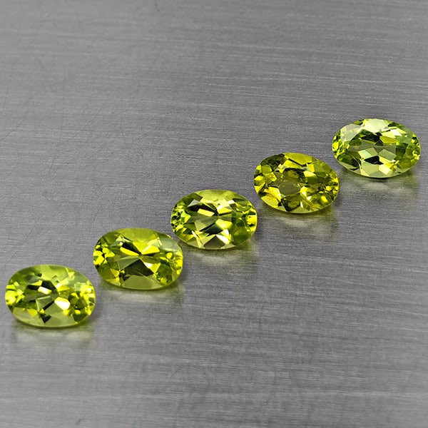 Natural Green Peridot Gemstones 2.80 Ct. 5 Pcs. Oval Shape 6 x 4 Mm.: Product ID: 805317754 Product Name: Natural Peridot Weight: 2.80 CT. Size: 6 x 4 x 3 MM. Shape: Oval Shape Color: Green Clarity:VVS-VSI Luster: Good Gems Origin: Pakistan Treatment: Unheated Crystal S