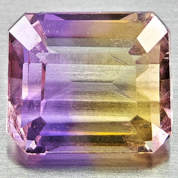 Natural Bi Color Ametrine Gemstones 2.08 Ct. Octagon Shape 8.2 x 6.9 Mm.: Product ID: 800408496 Product Name: Natural Ametrine Weight: 2.08 CT. Size: 8.2 x 6.9 x 4.8 MM. Shape: Octagon Color: Bi Color Clarity:VSI Luster: Good Gems Origin: Bolivia Treatment: Unheated Crystal