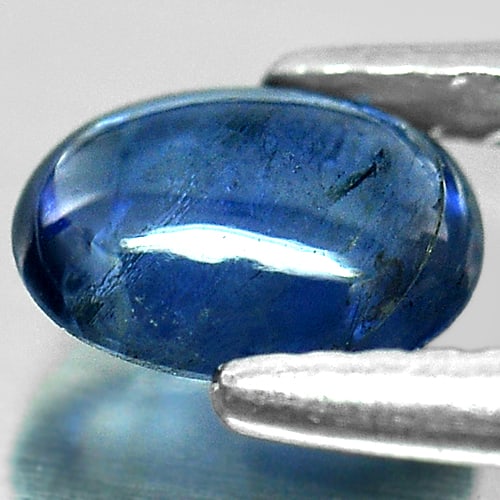 Natural Blue Sapphire Gemstones 0.80 Ct. Oval Cabochon Shape 6.7 x 5 Mm.: Product ID: 806146946 Product Name: Natural Blue Sapphire Weight: 0.80 CT. Size: 6.7 x 5 x 2.4 MM. Shape: Oval Color: Blue Clarity:Semi - Transparent Luster: Good Gems Origin: Madagascar Treatment: He