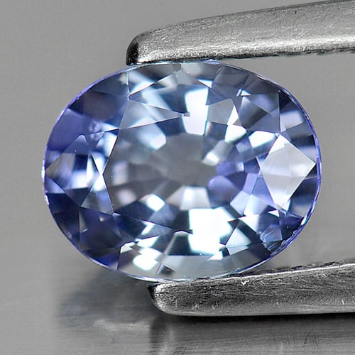 Natural Violet Blue Tanzanite Gemstones 1.13 Ct. Oval Shape 7.3 x 5.8 Mm.: Product ID: 807002057 Product Name: Natural Tanzanite Weight: 1.13 CT. Size: 7.3 x 5.8 x 3.8 MM. Shape: Oval Color: Violet Blue Clarity:VSI Luster: Good Gems Origin: Tanzania Treatment: Heated Crystal