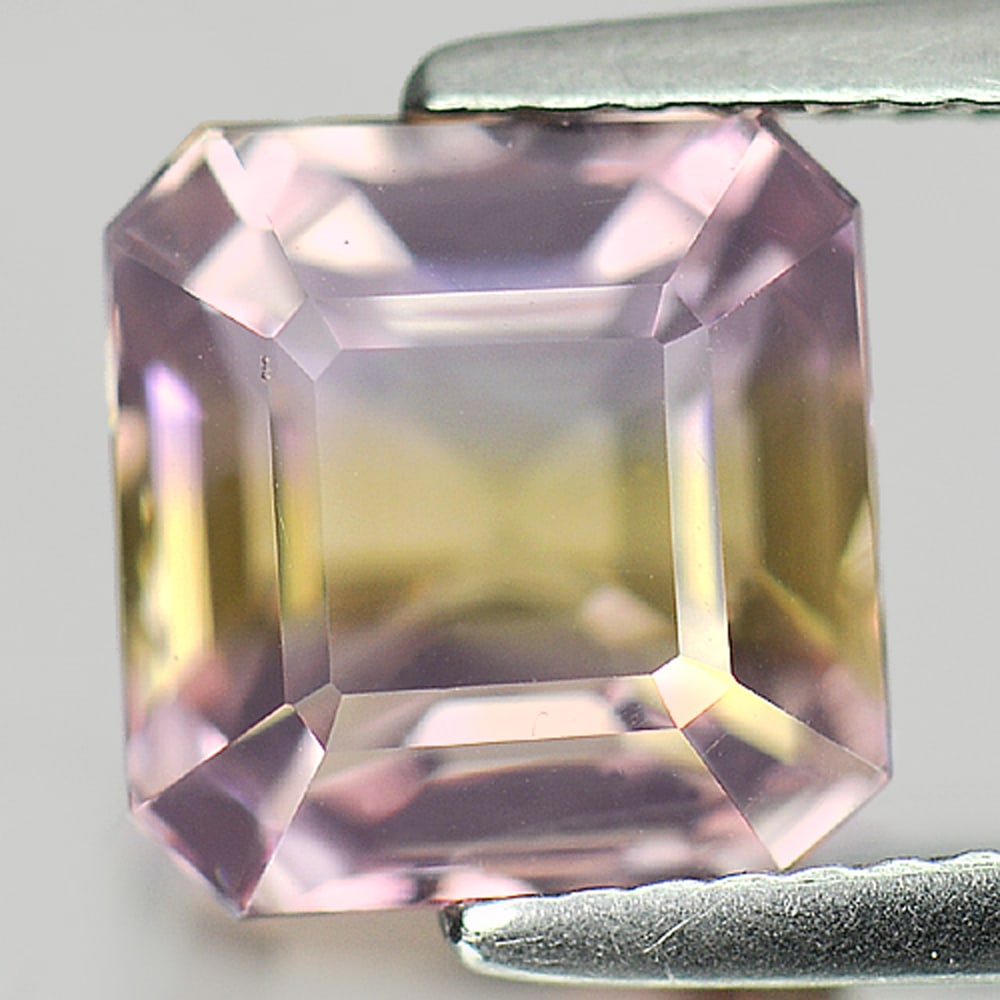 Natural Bi Color Ametrine Gemstones 4.12 Ct. Octagon Shape 8.8 x 8.5 Mm.: Product ID: 800405150 Product Name: Natural Ametrine Weight: 4.12 CT. Size: 8.8 x 8.5 x 7.5 MM. Shape: Octagon Color: Bi Color Clarity:VVS Luster: Good Gems Origin: Bolivia Treatment: Unheated Crystal