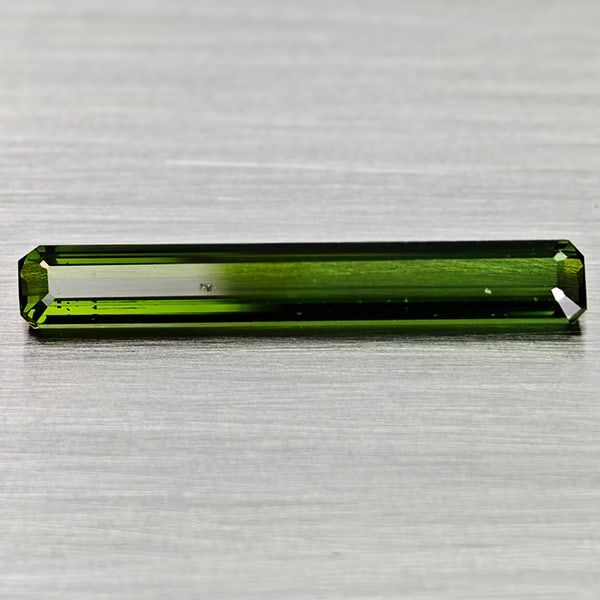 Natural Green Tourmaline Gemstones 2.05 Ct. Ocatgon Shape 20.3 x 3.4 Mm.: Product ID: 807250851 Product Name: Natural Tourmaline Weight: 2.05 CT. Size: 20.3 x 3.4 x 2.5 MM. Shape: Octagon Color: Green Clarity:VVS Luster: Good Gems Origin: Nigeria Treatment: Unheated Crystal