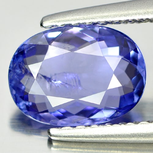 Natural Violetish Blue Tanzanite 1.30 Ct. Oval Shape 8.5 x 6.2 Mm.: Product ID: 807004444 Product Name: Natural Tanzanite Weight: 1.30 CT. Size: 8.5 x 6.2 x 3.1 MM. Shape: Oval Color: Blue Clarity:SI Luster: Good Gems Origin: Tanzania Treatment: Heated Crystal Structu