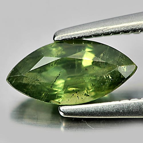 Natural Yellowish Green Sapphire Gemstones 0.74 Ct. Marquise Shape 8.2 x 4 Mm.: Product ID: 806158921 Product Name: Natural Green Sapphire Weight: 0.74 CT. Size: 8.2 x 4 x 2.9 MM. Shape: Marquise Color: Yellowish Green Clarity:SI1 Luster: Good Gems Origin: Thailand Treatment: Hea