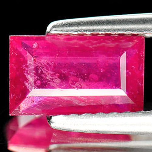 Natural Purplish Red Ruby Gemstones 1.81 Ct. Baguette Shape 8.6 x 5.1 Mm.: Product ID: 805927660 Product Name: Natural Ruby Weight: 1.81 CT. Size: 8.6 x 5.1 x 3.2 MM. Shape: Baguette Color: Purplish Red Clarity:VSI Luster: Good Gems Origin: Madagascar Treatment: Heated (Lead