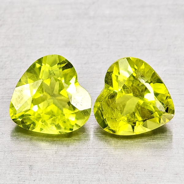 Natural Green Peridot Gemstones 1.67 Ct. 2 Pcs. Heart Shape 6 x 6 Mm.: Product ID: 805317280 Product Name: Natural Peridot Weight: 1.67 CT. Size: 6 x 6 x 3.6 MM. Shape: Heart Shape Color: Green Clarity:VSI - SI1 Luster: Good Gems Origin: Pakistan Treatment: Unheated Crys