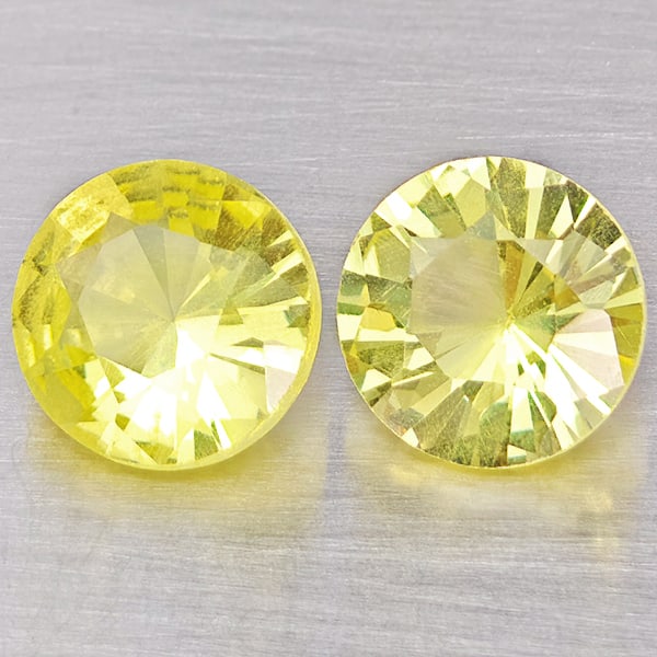 Natural Yellow Lemon Quartz Gemstones 3.57 Ct. 2 Pcs. Round Diamond Cut 8.2 Mm.: Product ID: 805530157 Product Name: Natural Quartz Weight: 3.57 CT. Size: 8.2 x 8.2 x 5.2 MM. Shape: Round Diamond Cut Color: Yellow Lemon Clarity:VSI Luster: Good Gems Origin: Brazil Treatment: Unhea