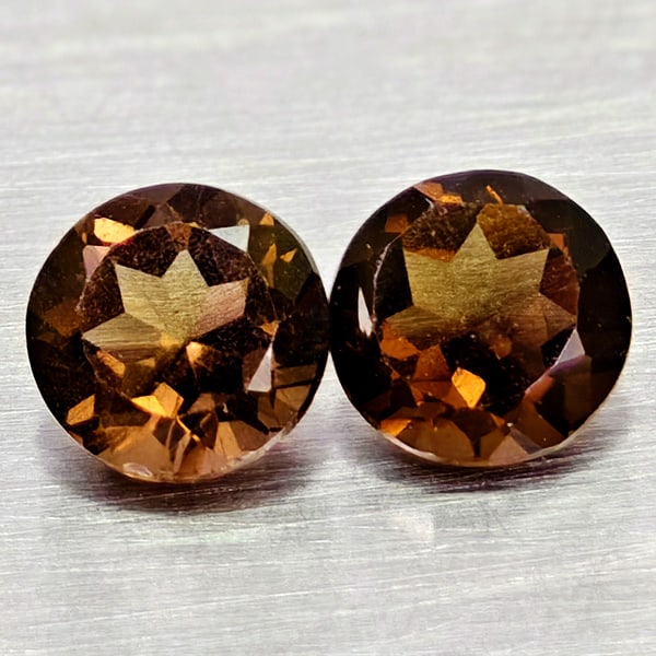 Natural Smokey Color Quartz Gemstones 1.13 Ct. 2 Pcs. Round Shape 5.5 Mm.: Product ID: 805529911 Product Name: Natural Quartz Weight: 1.13 CT. Size: 5.5 x 5.5 x 3.4 MM. Shape: Round Color: Smokey Clarity:VSI Luster: Good Gems Origin: Brazil Treatment: Unheated Crystal Struct