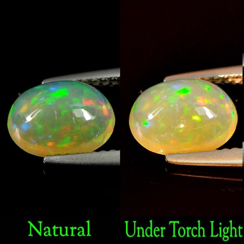 Natural Multi Color Opal Gemstones 1.28 Ct. Oval Cabochon Shape 9.1 x 7.1 Mm.: Product ID: 818727074 Product Name: Natural Opal Weight: 1.28 CT. Size: 9.1 x 7.1 x 4.8 MM. Shape: Oval Cabochon Color: Multi-Color Clarity:Semi - Transparent Luster: Iridescent Gems Origin: Ethiopia 
