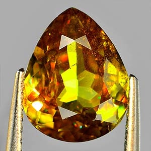 Natural Multi Color Sphene Gemstones With Rainbow Spark 2.44 Ct. Pear Shape 10.1 x 8.1 Mm.: Product ID: 806505863 Product Name: Natural Sphene Weight: 2.44 CT. Size: 10.1 x 8.1 x 4.3 MM. Shape: Pear Color: Multi Color Titanium With Rainbow Spark Clarity:VSI Luster: Adamantine Gems Origin: Ma
