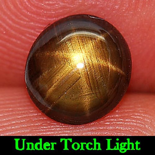 Natural Golden Star Sapphire Gemstones 1.31 Ct. Oval Cabochon Shape 6.69 x 7.23 Mm.: Product ID: 806149986 Product Name: Natural Star Sapphire Weight: 1.31 CT. Size: 6.69 x 7.23 x 2.39 MM. Shape: Oval Cabochon Color: Yellow Clarity:Opaque Luster: Good 6 Ray Star Gems Origin: Thailand 