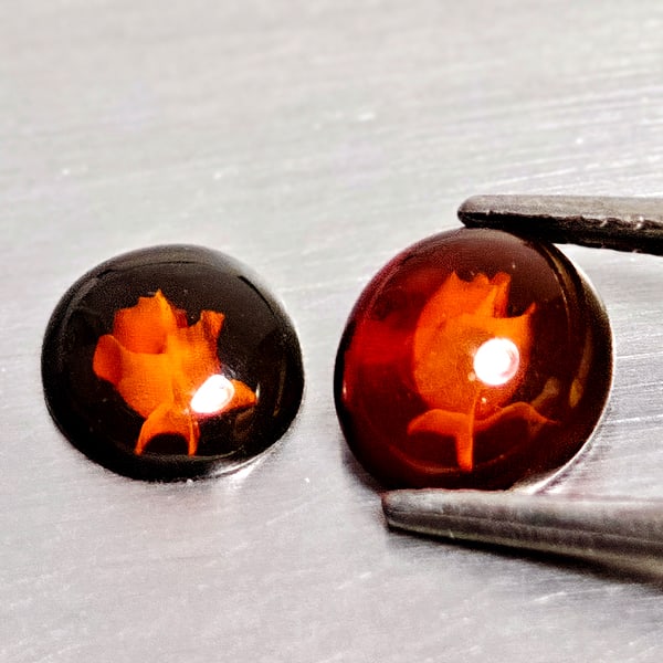 Natural Brown Yellow Amber 0.65 Ct. 2 Pcs. Flower Carving In Oval Cabochon Shape 7.6 x 6.5 Mm.: Product ID: 819091039 Product Name: Natural Amber Weight: 0.65 CT. Size: 7.6 x 6.5 x 2.7 MM. Shape: Oval Cabochon Color: Brown Yellow Clarity:Semi - Transparent Luster: Good Gems Origin: Poland Treatm