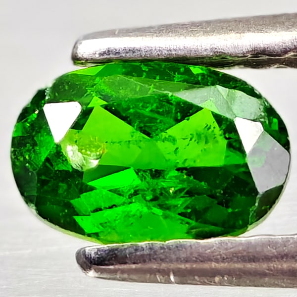 Natural Green Chrome Diopside Gemstones 0.55 Ct. Oval Shape 6 x 4 Mm.: Product ID: 801608193 Product Name: Natural Chrome Diopside Weight: 0.55 CT. Size: 6 x 4 x 3 MM. Shape: Oval Color: Green Clarity:VSI - SI1 Luster: Good Gems Origin: Russia Treatment: Unheated Crystal