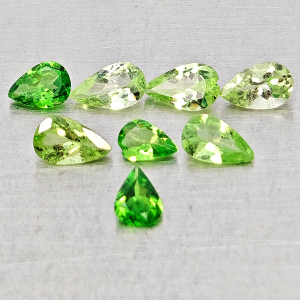 Natural Green Tsavorite Garnet Gemstones 1.38 Ct. 8 Pcs. Pear Shape and Mixed Size: Product ID: 803005093 Product Name: Natural Tsavorite Weight: 1.38 CT. Size: 3.1 x 5 x 2 to 3 x 4 x 1.6 MM. Shape: Pear Shape Color: Green Clarity:SI Luster: Good Gems Origin: Tanzania Treatment: Unhe
