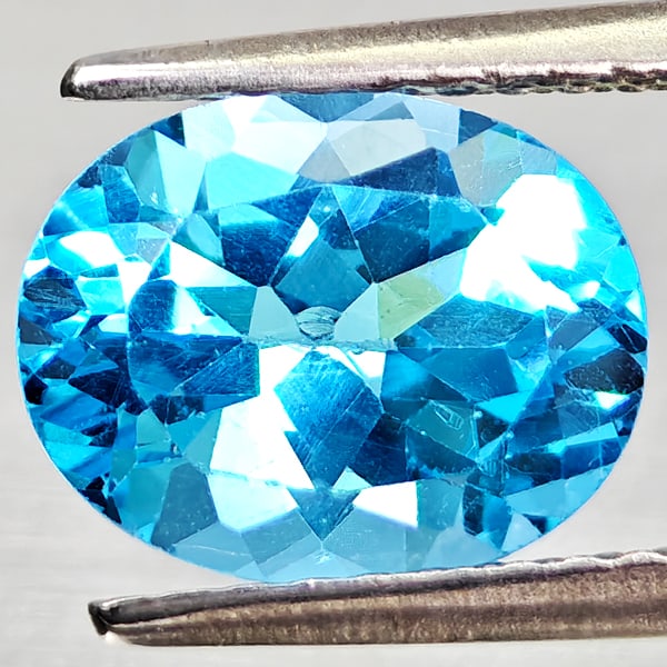 Natural Swiss Blue Topaz Gemstones 2.41 Ct. Oval Shape 9.1 x 7.2 Mm.: Product ID: 807168128 Product Name: Natural Blue Topaz Weight: 2.41 CT. Size: 9.1 x 7.2 x 9 MM. Shape: Oval Shape Color: Swiss Blue Clarity:VVS - VSI Luster: Good Gems Origin: Brazil Treatment: Treate
