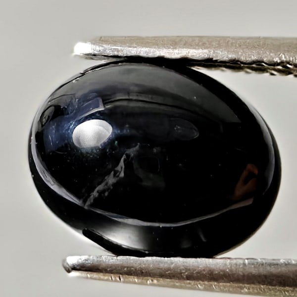 Natural Black Spinel Gemstones 2.30 Ct. Oval Cabochon Shape 9 x 7.1 Mm.: Product ID: 806609910 Product Name: Natural Spinel Weight: 2.30 CT. Size: 9 x 7.1 x 3.6 MM. Shape: Oval Cabochon Color: black Clarity:Opaque Luster: Good Gems Origin: Thailand Treatment: Unheated Crys