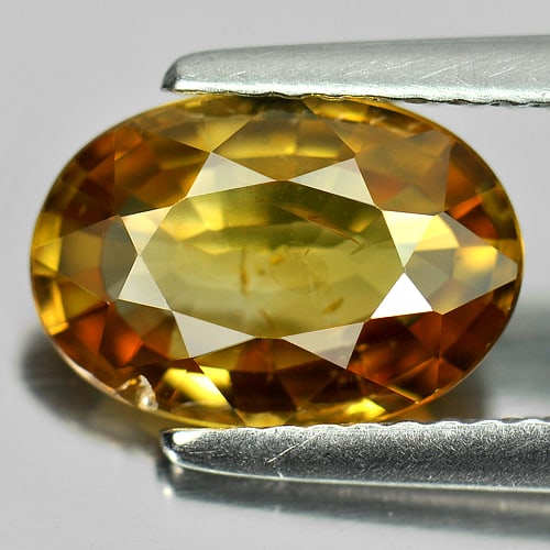 Natural Yellow Zircon Gemstones 3.05 Ct. Oval Shape 10.2 x 7.1 Mm.: Product ID: 807729128 Product Name: Natural Zircon Weight: 3.05 CT. Size: 10.2 x 7.1 x 3.6 MM. Shape: Oval Color: Yellow Clarity:VSI Luster: Very Good Gems Origin: Cambodia Treatment: Heated Crystal S