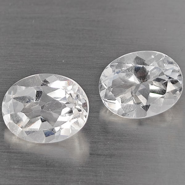 Natural White Quartz Gemstones 3.51 Ct. 2 Pcs. Oval Shape 9 x 7 Mm.: Product ID: 805530245 Product Name: Natural Quartz Weight: 3.51 CT. Size: 9 x 7 x 5.1 MM. Shape: Oval Color: White Clarity:VSI Luster: Good Gems Origin: Brazil Treatment: Unheated Crystal Structure: H