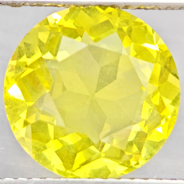 Natural Yellow Lemon Quartz Gemstones 4.54 Ct. Round Shape 11.1 Mm.: Product ID: 805530194 Product Name: Natural Quartz Weight: 4.54 CT. Size: 11.1 x 11.1 x 6.5 MM. Shape: Round Shape Color: Yellow Lemon Clarity:VSI Luster: Good Gems Origin: Brazil Treatment: Unheated 
