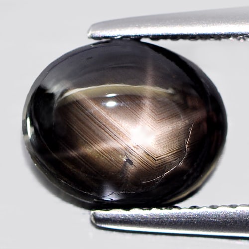 Natural Black Star Sapphire Gemstones 3.11 Ct. Oval Cabochon Shape 9 x 7.3 Mm.: Product ID: 806143412 Product Name: Natural Star Sapphire Weight: 3.11 CT. Size: 9 x 7.3 x 4 MM. Shape: Oval Cabochon Color: Black Clarity:Opaque Luster: Good 6 Rays Star Gems Origin: Thailand Treatme