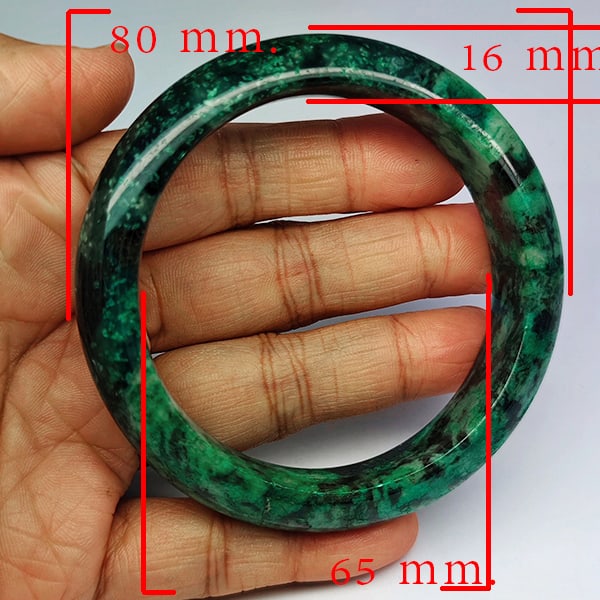Natural Mulit Color Jade Gemstones Bangle 409.08 Ct. Diameter 65 Mm.: Product ID: 819816127 Product Name: Natural Gemstones Weight: 409.08 CT. Size: 80 x 65 x 16 MM. Shape: Round Shape Color: Multi-Color Green Clarity:Opaque Luster: Good Gems Origin: Thailand Treatment:
