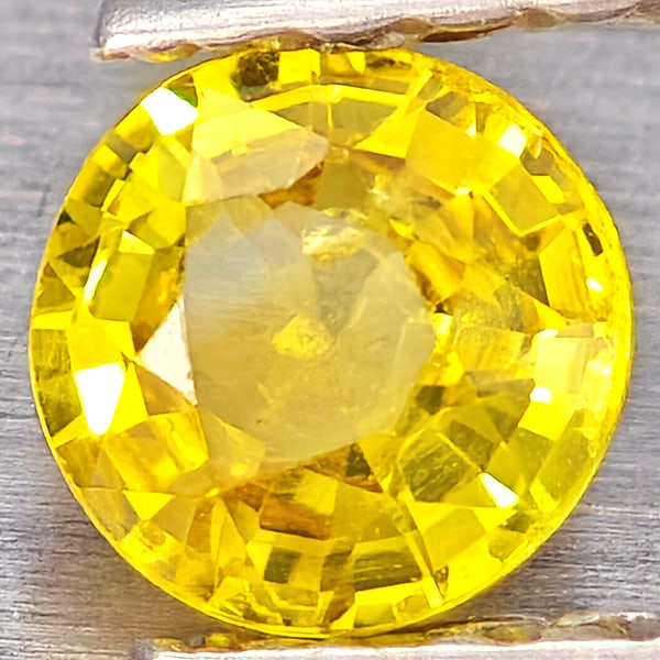 Natural Yellow Sapphire Gemstones 0.33 Ct. Round Shape 4.2 Mm.: Product ID: 806162920 Product Name: Natural Yellow Sapphire Weight: 0.33 CT. Size: 4.2 x 4.2 x 2.2 MM. Shape: Round Shape Color: Yellow Clarity:VSI Luster: Good Gems Origin: Thailand Treatment: Heated